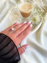 Round Halo Ring in Gold with Diamonds