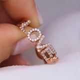 Love Ring in gold with diamonds