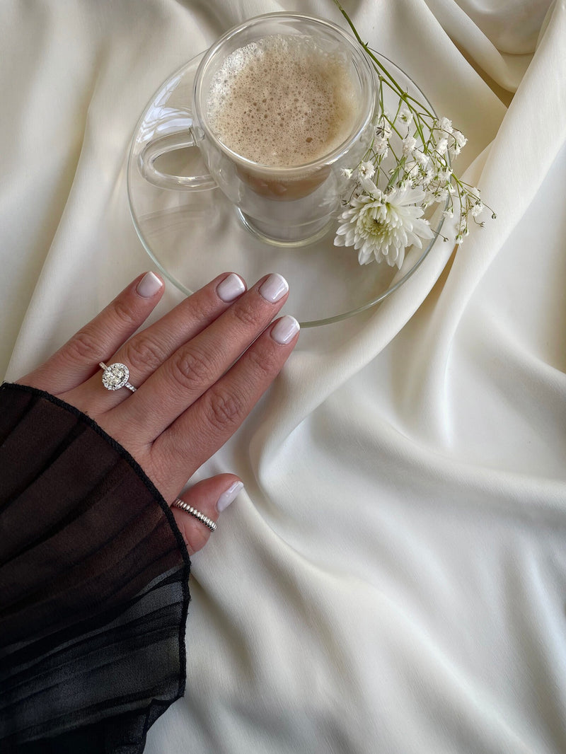 Oval Shape Ring in Gold with Diamonds