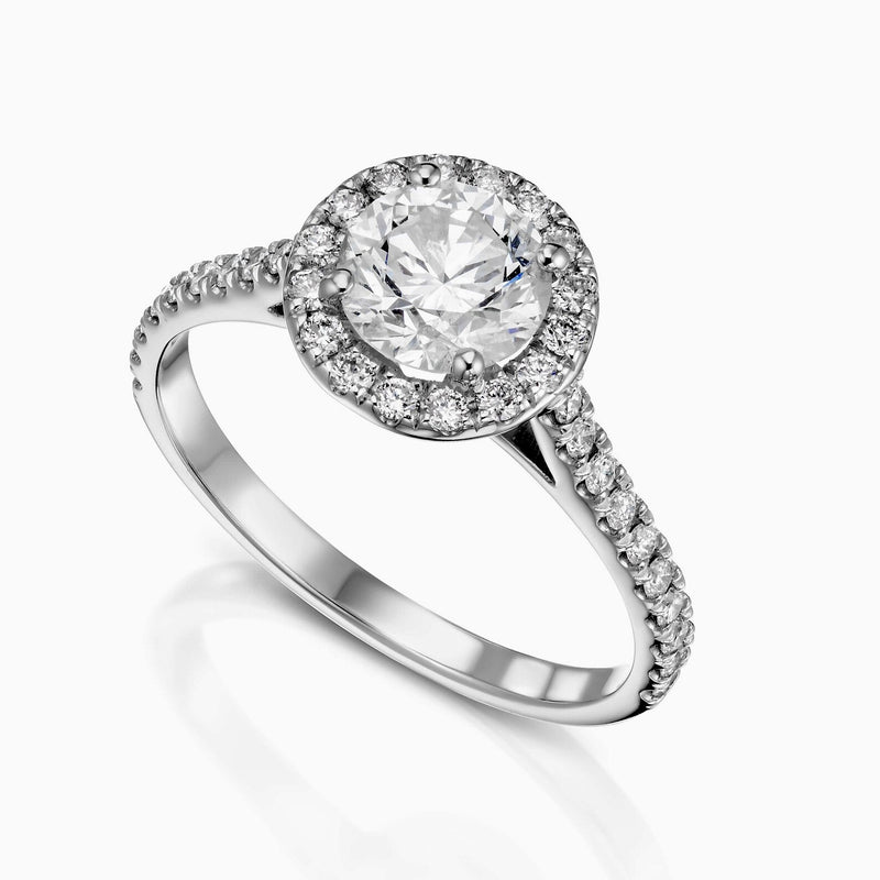 Round Halo Ring in Gold with Diamonds