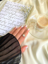 Round Halo Ring in Gold with Diamonds