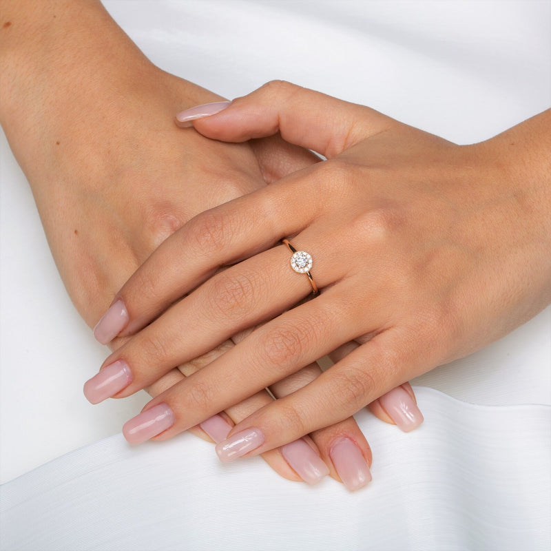 Round Shape Halo Style Ring in Gold with Diamonds
