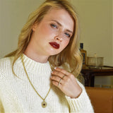 Two Finger Ring in gold with diamonds