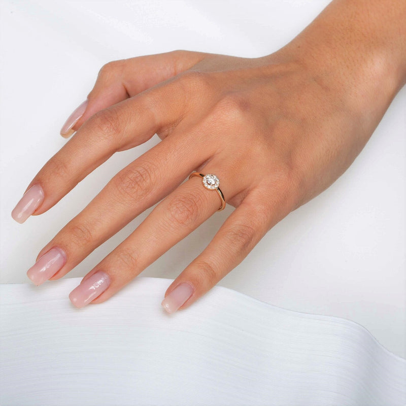Round Shape Halo Style Ring in Gold with Diamonds