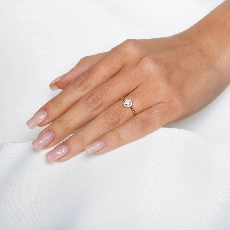 Round Shape Halo Style Ring in Gold with Diamonds