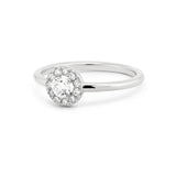 Round Shape Halo Style Ring in Gold with Diamonds