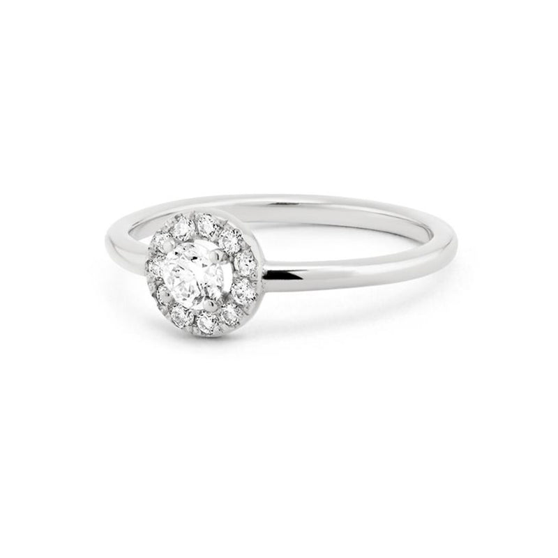 Round Shape Halo Style Ring in Gold with Diamonds