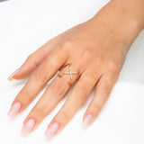 Cross Ring in gold with diamonds