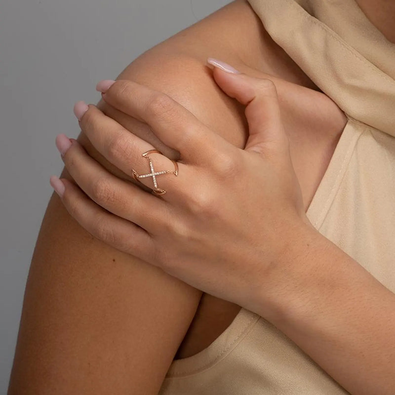 Cross Ring in gold with diamonds