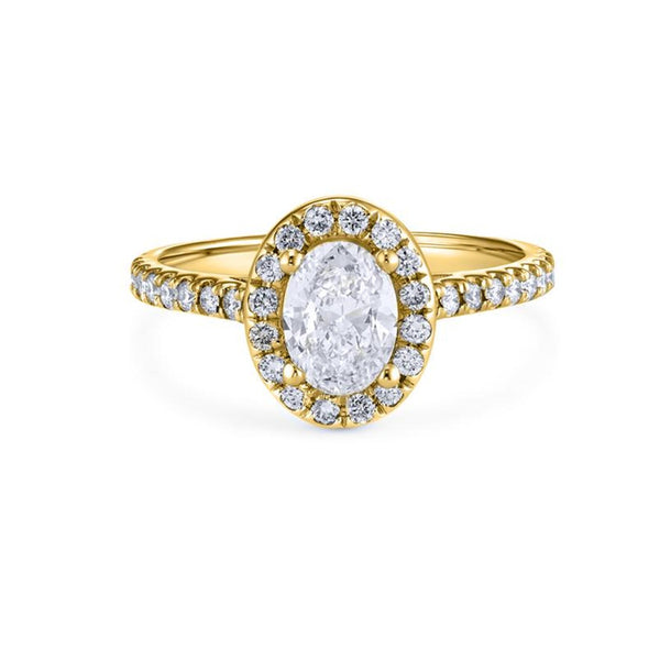 Oval Shape Ring in Gold with Diamonds
