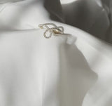 Infinity Ring in Gold with Diamonds