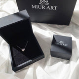 Round Ring in Gold with Diamonds