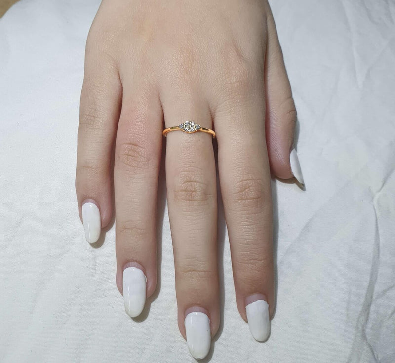 Round Ring in Gold with Diamonds