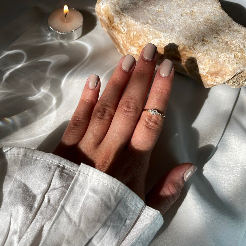 Round Ring in Gold with Diamonds