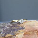 Round Ring in Gold with Diamonds